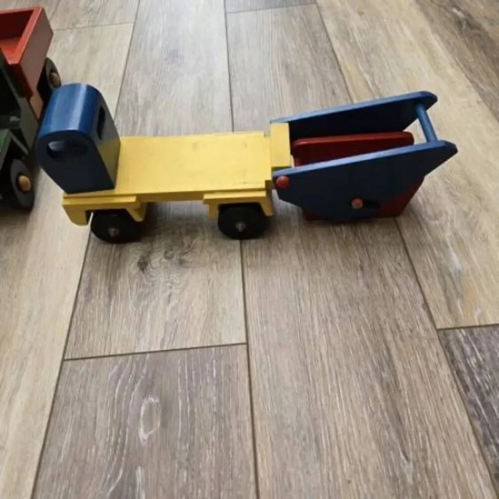 2 vintage Romania toy wooden trucks colorful, moving parts collectible
